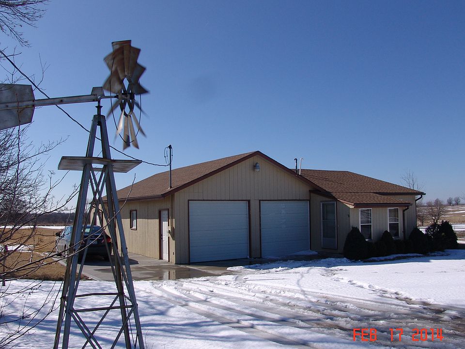 Front of house w/windmill