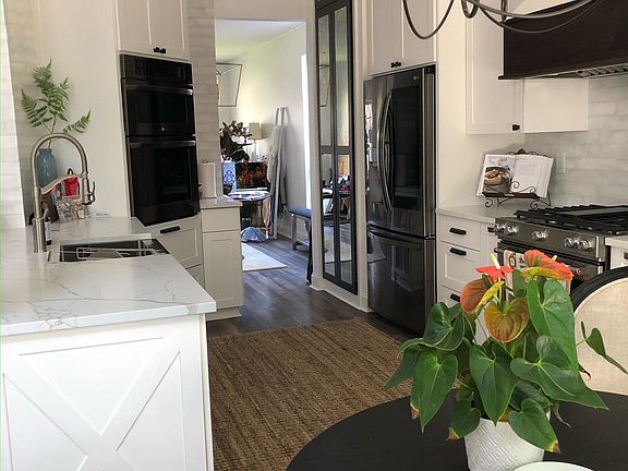 newly updated Modern farmhouse style kitchen. With gas range cooking and electric wall oven for baking.