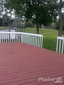 Private setting  with huge yard and spatious deck in excellent condition