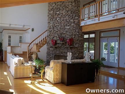 Open floor plan with beautiful hardwood floors