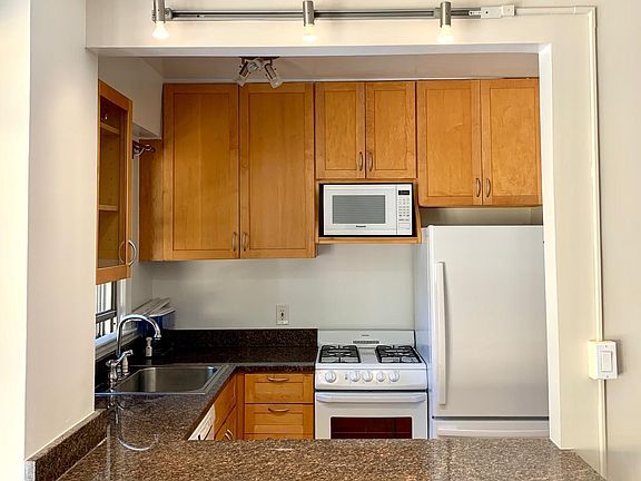 Kitchen with bar/island