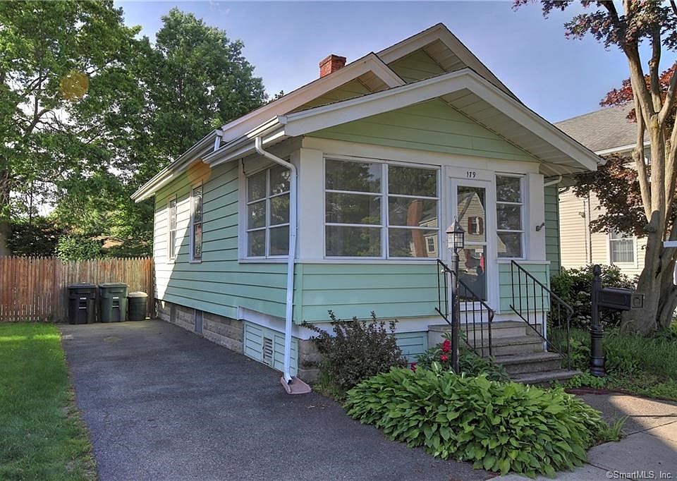 Paved drive leads to fully fenced rear yard!