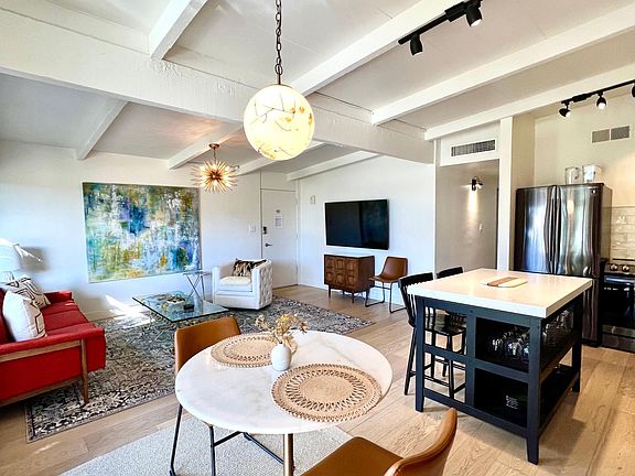 dining area open to main living area and kitchen