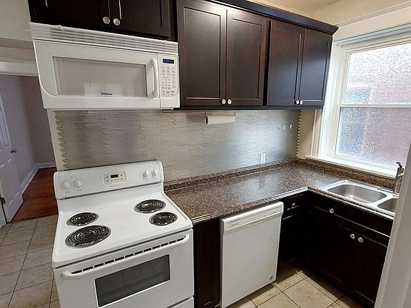 Kitchen with ceramic tiled floor