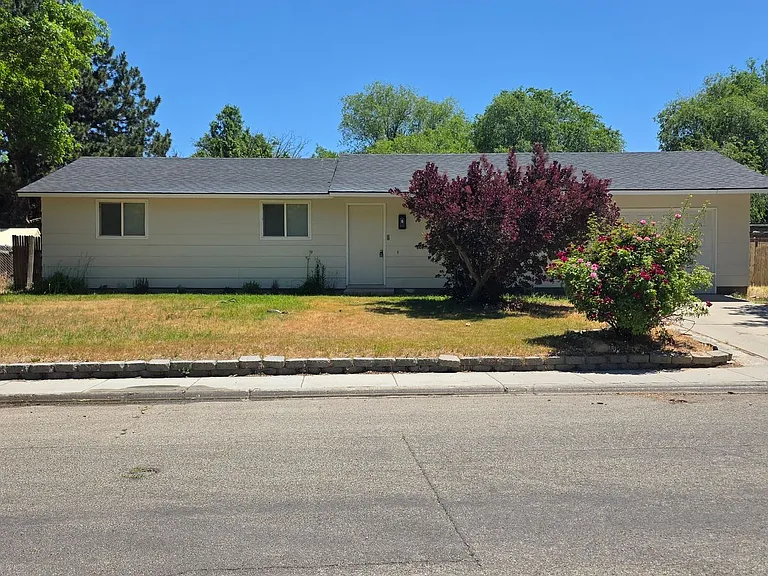 7206 S Ravenswood Way — Photo 1