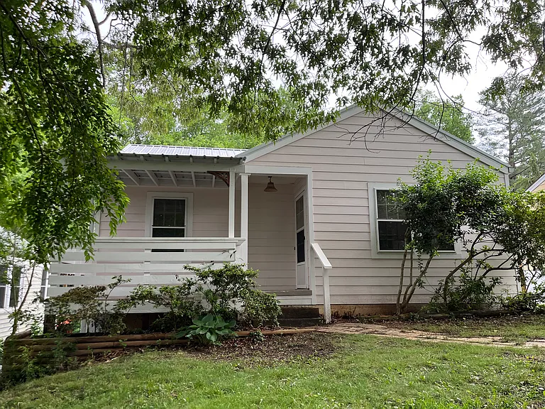 Front of house. Brand new siding and just painted.