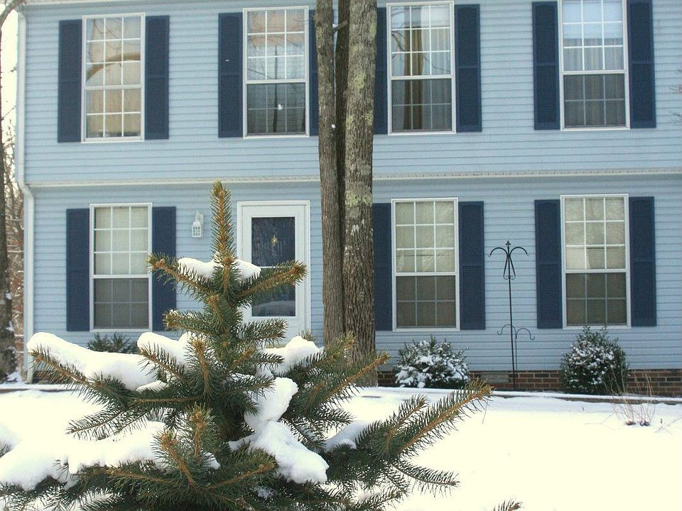 Our home from the street in winter.