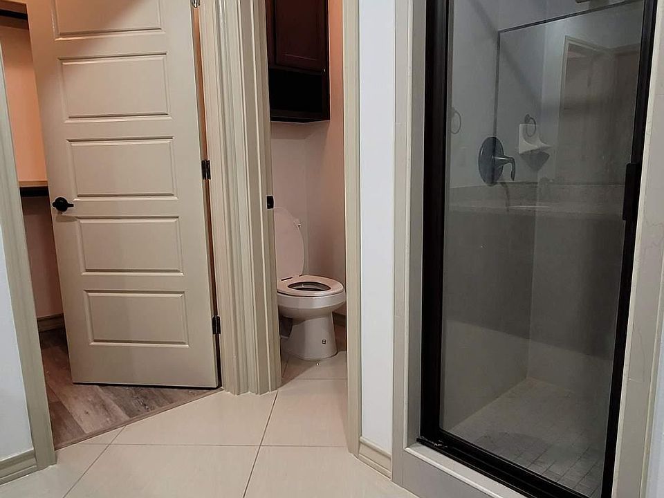 masters bedroom's restroom and full bath