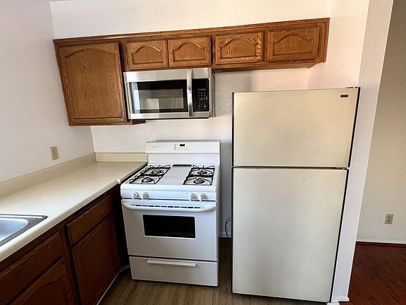 Kitchen with newly installed microwave