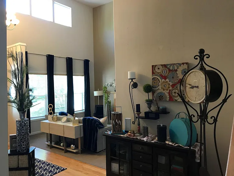 View of the tall living room.. before we added the new floors
