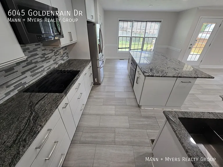 6045 Goldenrain Dr — Photo 19