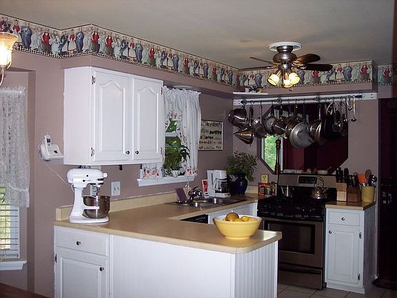 view of kitchen from garage exit door.