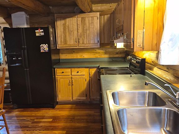 4th image of 9675 Roaring Rapids Rd