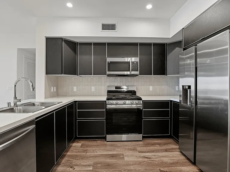 Kitchen with Energy-Efficient Appliances and Ample Cabinet Storage