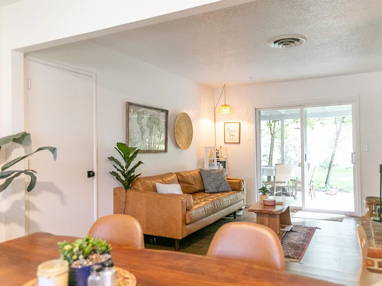 Second living room and dining area with furnishings. (furnishings not included).