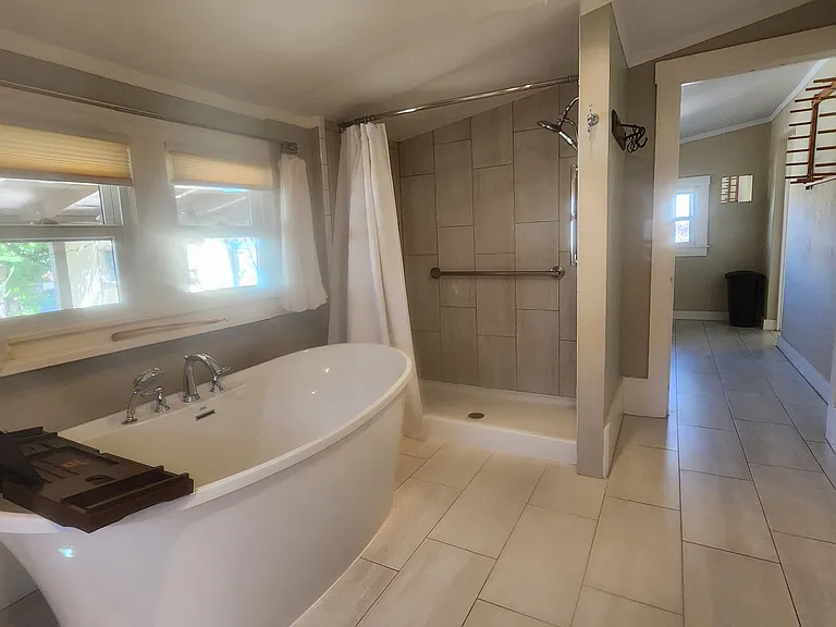 View of tub and shower too
