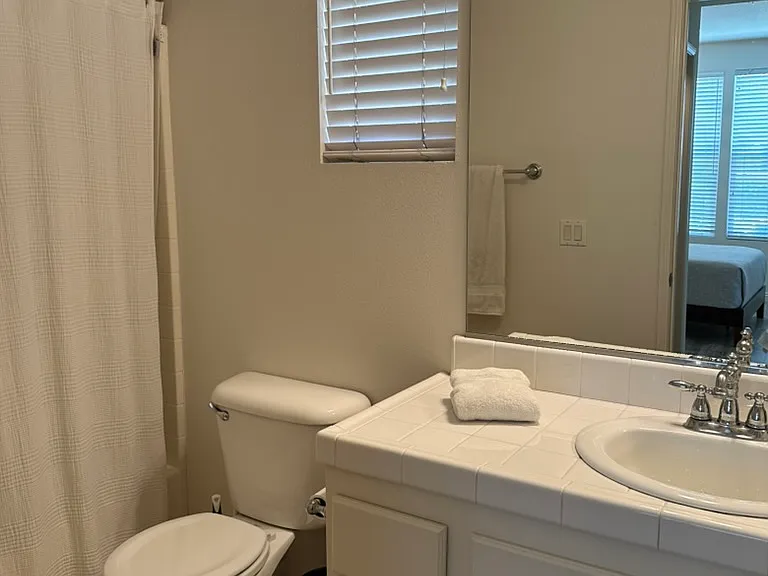 Full bathroom attached to downstairs bedroom