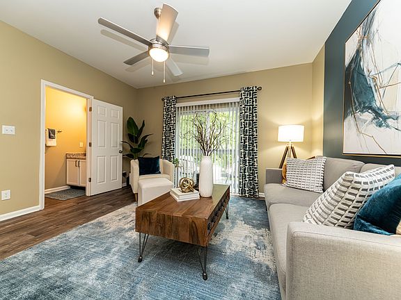 Spacious living room with hardwood-style flooring
