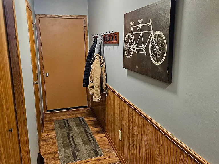 Coat rack for your convenience right at the garage door entry/exit.