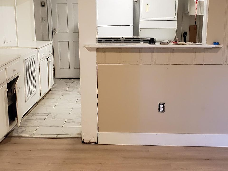 Looking from main room into kitchen and back door.