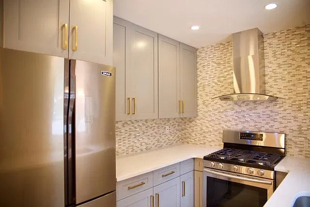 Sunny, designer planned kitchen, Quartz countertops, new cab