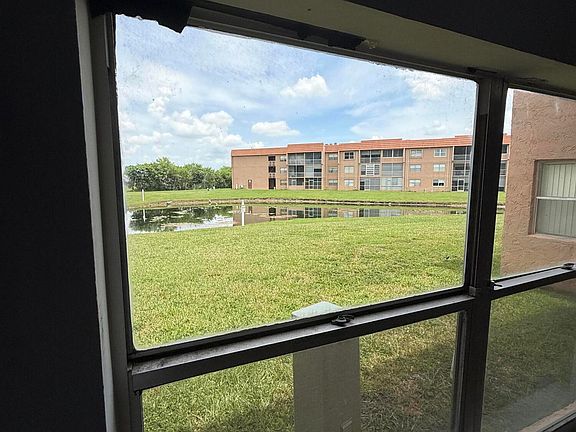 4th image of 9881 SUNRISE LAKES Boulevard #104