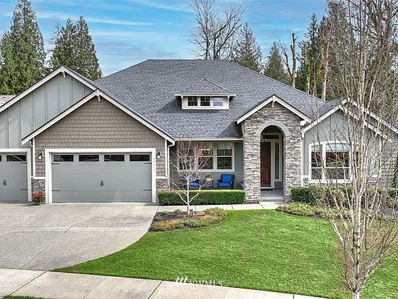 Classic style and impressive stature. This 4-bedroom home also offers an impressive 3-car garage with a custom floor coating.