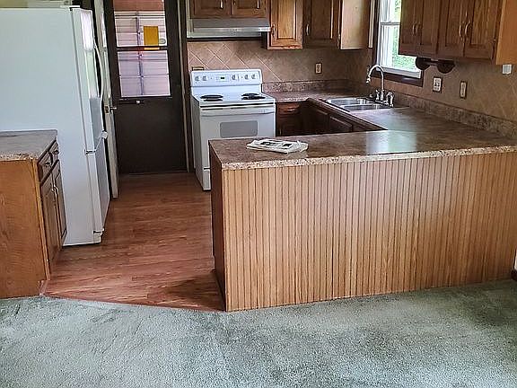 view of kitchen from dining area