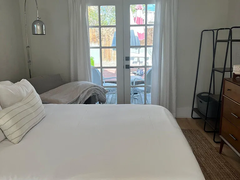 Access to private patio thru the double doors in the bedroom.