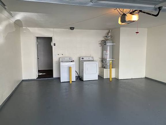 GARAGE WITH WASHER AND DRYER HOOK UPS