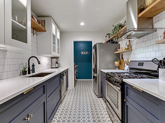Modern Kitchen with Stainless Steel Appliances. Gas stove.