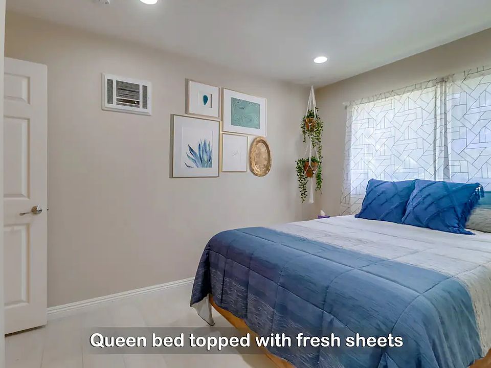 Wake up to a bright & refreshing morning on your comfy queen bed in Bedroom 3