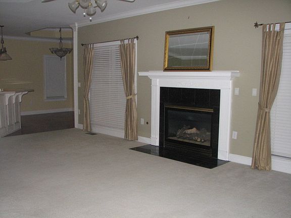 Den with open plan to kitche