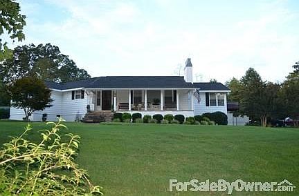 Front View
						:
						Picturesque setting. Home is on hill set off away from road!