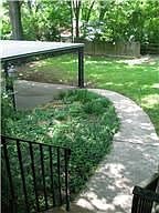 House features a huge carport AND two car garage