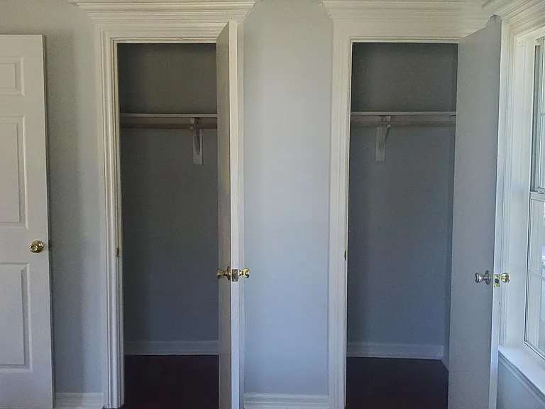 large front bedroom with 2 closets with hallway bathroom