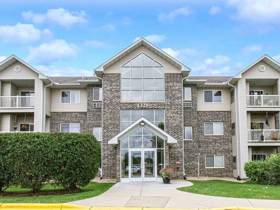 Condo is to the left of the front door on first floor