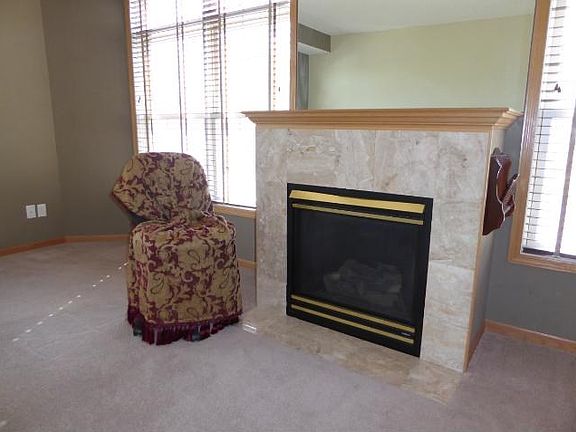 STYLE AND SUBSTANCE Sprawling open floor plan with multiple sets of full length windows adds plenty of natural light!