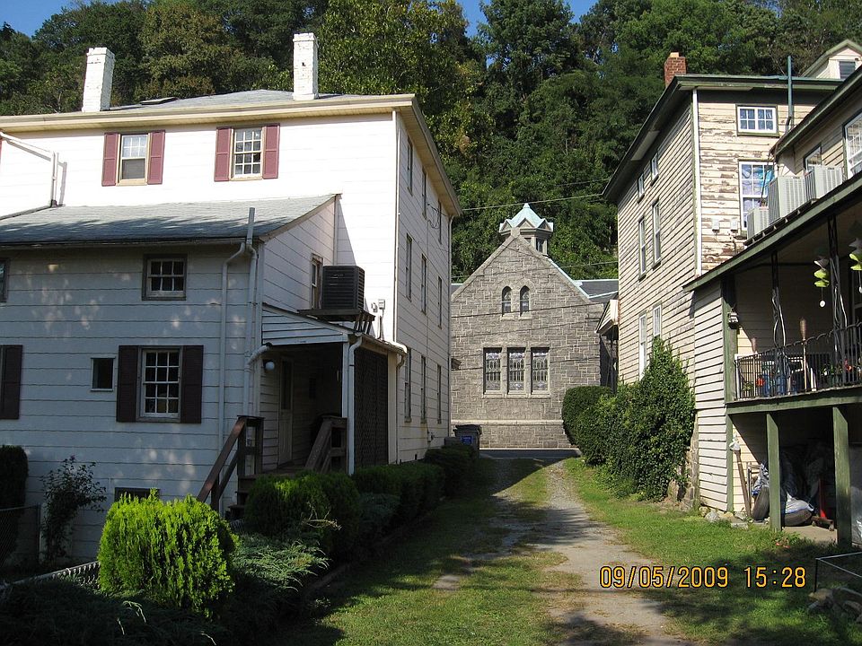 Rear entrance, and fenced backyard