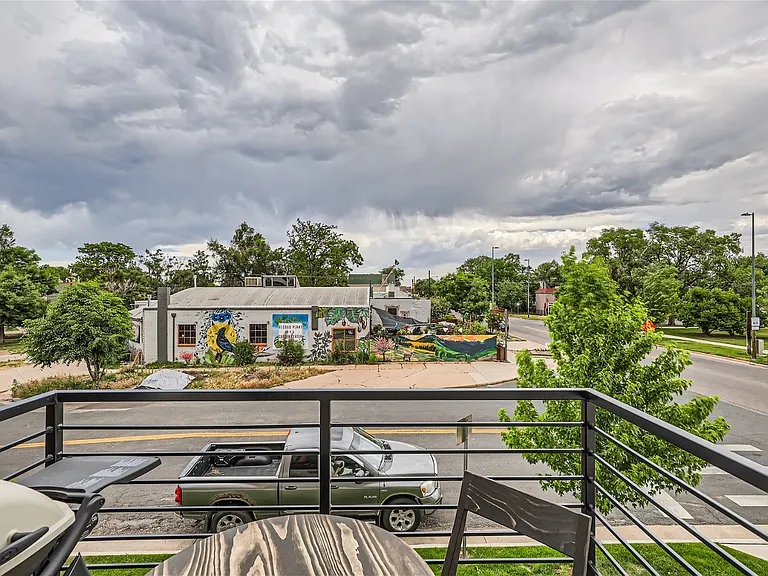 2nd floor patio with grill and cafe table for your morning coffee