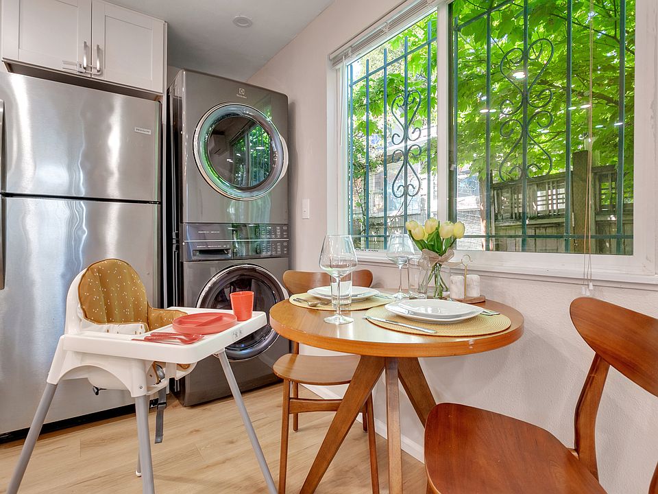 High-chair and plastic dinnerware for kids available for guest use.