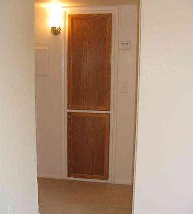 Hall w/ Oak Linen Doors