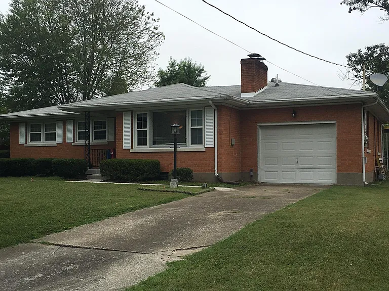 10303 Sunlight Ln. 
Garage Door Opener so you can just pull in!