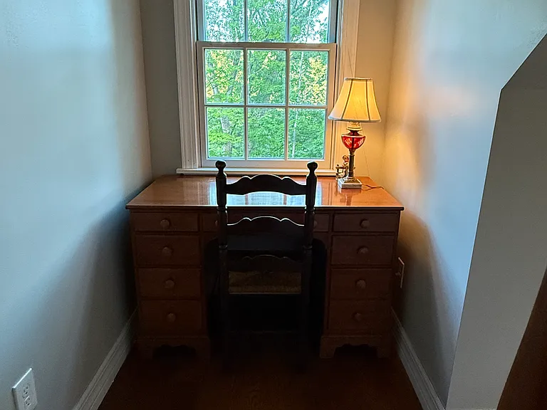 Guest bedroom desk in nook