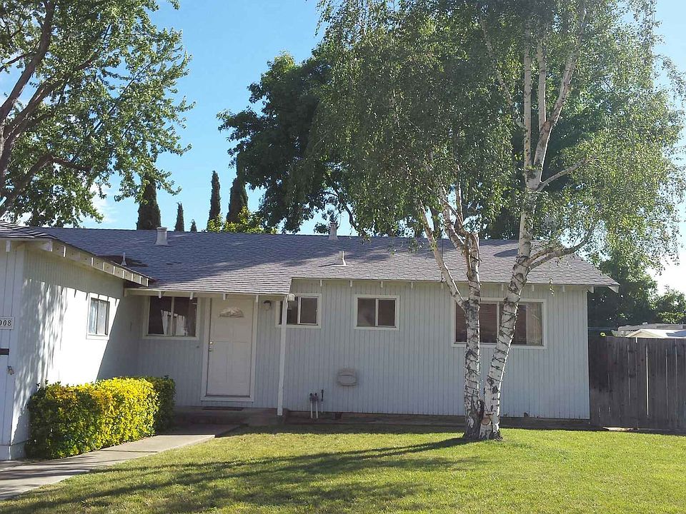 Front of house with Berch tree