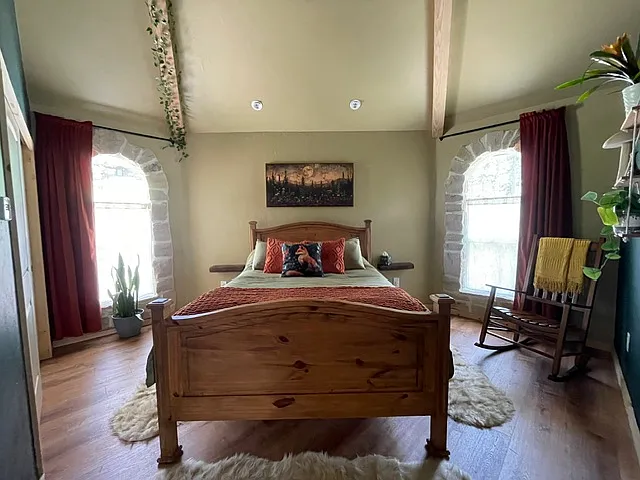 Bedroom has a queen size bed. We can swap the rocking chair out for an armoire for added storage if you prefer. It also comes with blackout curtains in the bedroom and living room.