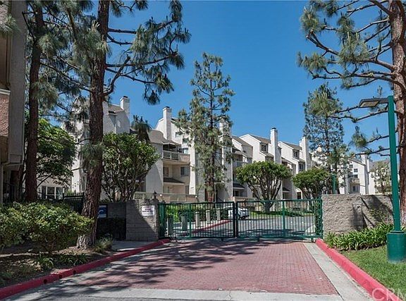 Entrance to Harbour Walk - gated community with plenty of guest parking in front of units