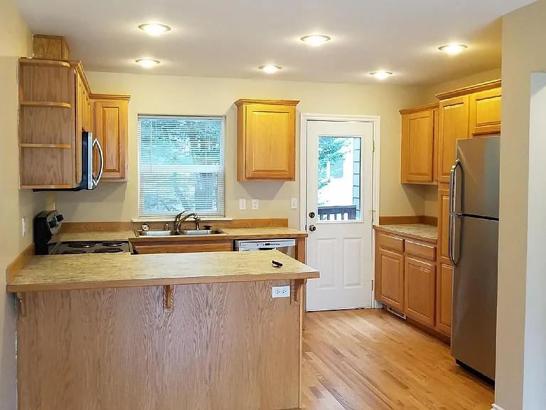 Light and Bright. Kitchen is open to family room and eating area.