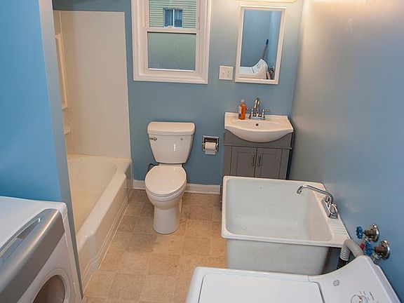 Bathroom with washer and dryer
