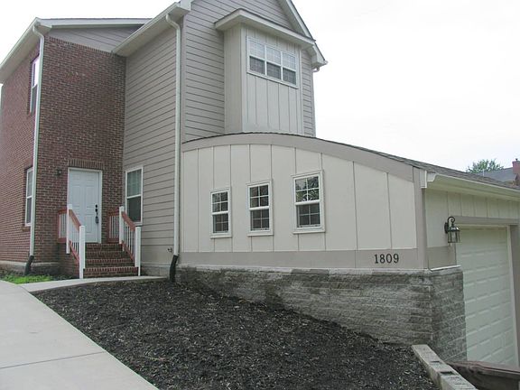 Front door and garage side view